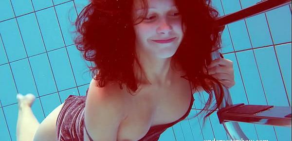  Brunette Nata Szilva strips underwater and gets horny